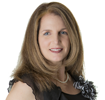 Head and shoulders portrait photograph of Mary Priolo