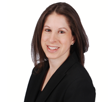 Head and shoulders portrait photograph of Nicole Karp